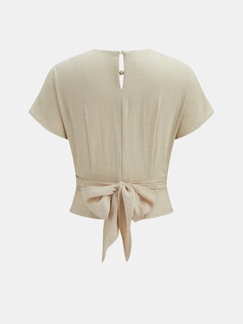 Blusa de manga corta cruzada con lazada trasera
