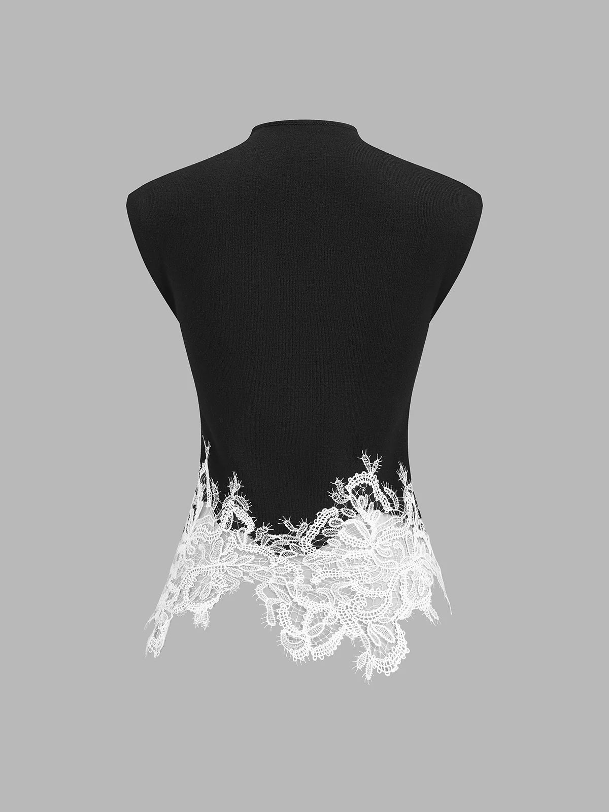 Top de punto con cuello halter y bajo de encaje asimétrico